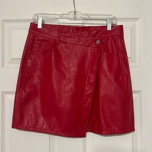Red leather asymmetrical skirt